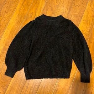 Never worn Black sweater with silver sparkles woven in. Size medium.